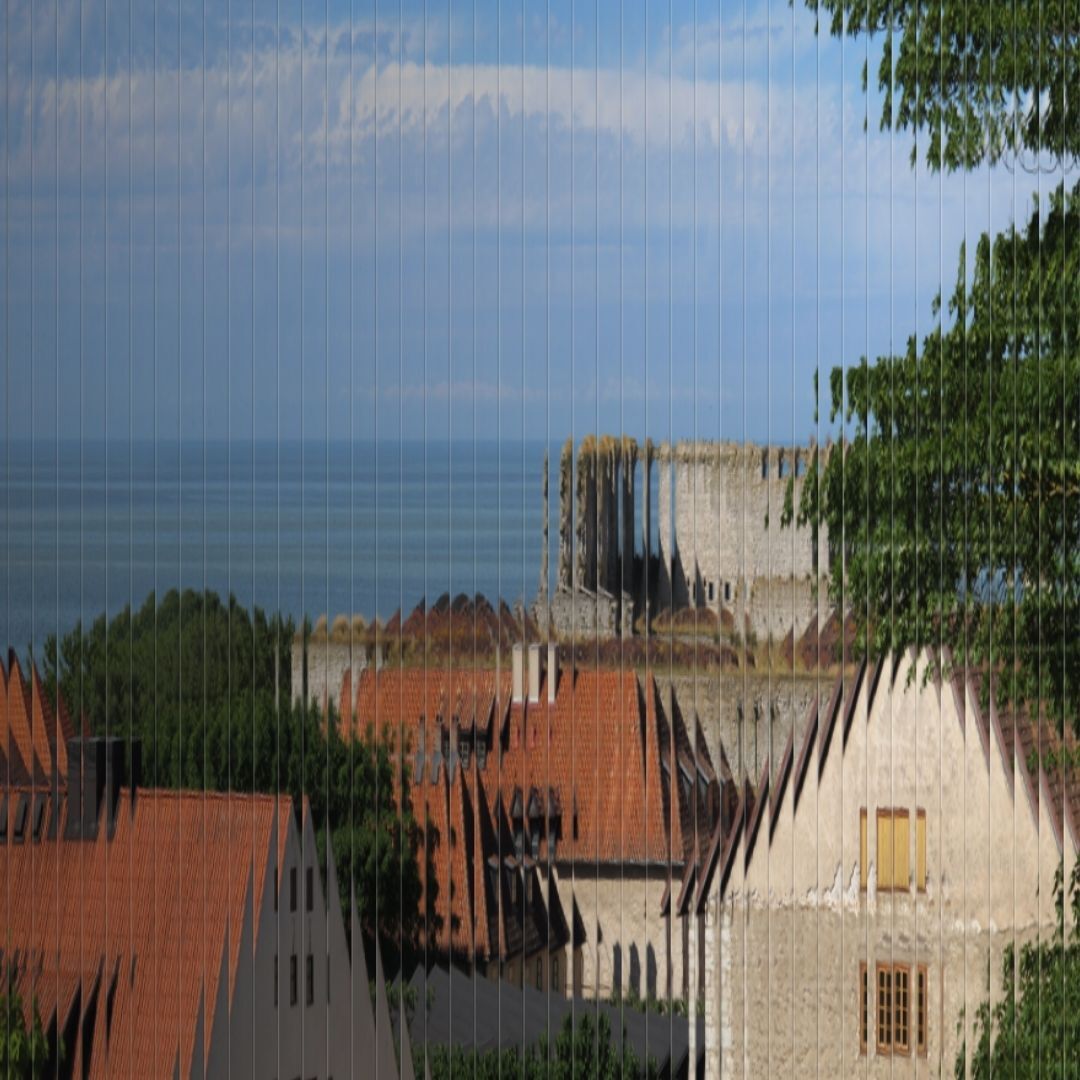Image, with an applied glass effect, showing a scenic view of old buildings and the sea, from Visby, Gotland